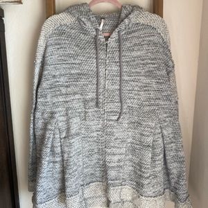 Oversized poncho style sweater with zipper/hood